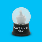 Funny Novelty Snow Globe – Quirky Mini Desk Gift for Office, Home, or Holiday – Unique Collectible Gag Gift for Friends and Coworkers - Have a Nice Day