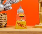 A Christmas Story Leg Lamp Mini Light-Up Snow Globe with Swirling Glitter Display | 3 Inches Tall