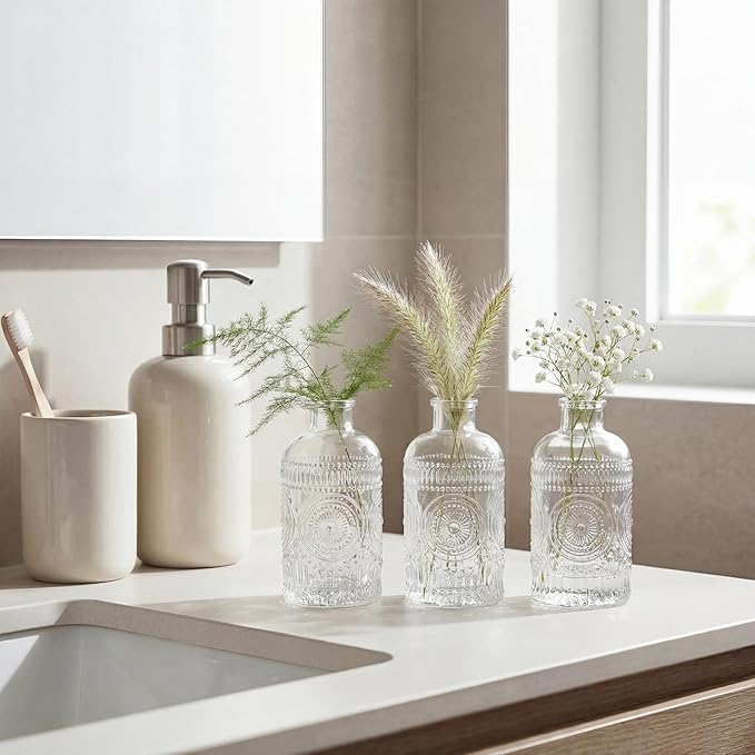 Kingrol 12 Pack Mini Glass Bud Vases, Small Clear Flower Vases for Single Stems, 4.9 Inch Vintage Embossed Bottles for Home Shelf, Bathroom & Desk Decor