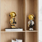EZ4ENCE Figurine Statue Astronaut Sculpture Spaceman Decor,Sculpture for Home Decor,Arts Gold and Black Shelf Decoration,Cool Metal Mask Table Decor,Large Spaceman Figure Ornament