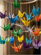 A Colorful Origami Crane Mobile Spinning in Soft Wind - Made in USA