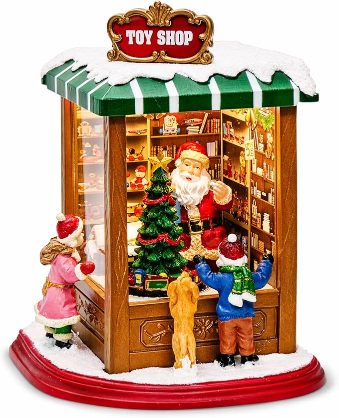 MOMENTS IN TIME Lighted Santa’s Christmas Village Shop LED Lights, Music & Animation Battery Operated 8.8” Holiday Building Christmas Decoration
