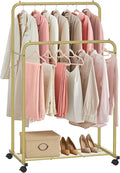 SONGMICS Double Rods Clothes Rack with Wheels, Clothing Rack for Hanging Clothes, Heavy Duty Garment Rack with Mesh Storage Shelf, 2 Brakes, Each Top Rail Holds up to 77 lb, Gold UHSR026A01