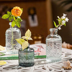Kingrol 12 Pack Mini Glass Bud Vases, Small Clear Flower Vases for Single Stems, 4.9 Inch Vintage Embossed Bottles for Home Shelf, Bathroom & Desk Decor