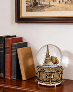 LED Music Snow Globe Vintage Eiffel Tower Buildings Embedded Carousel Retro Home Decoration for Book Shelf Cabinet Floating Board Office Desk Table Top Decor Centerpieces Ornament (Gold)