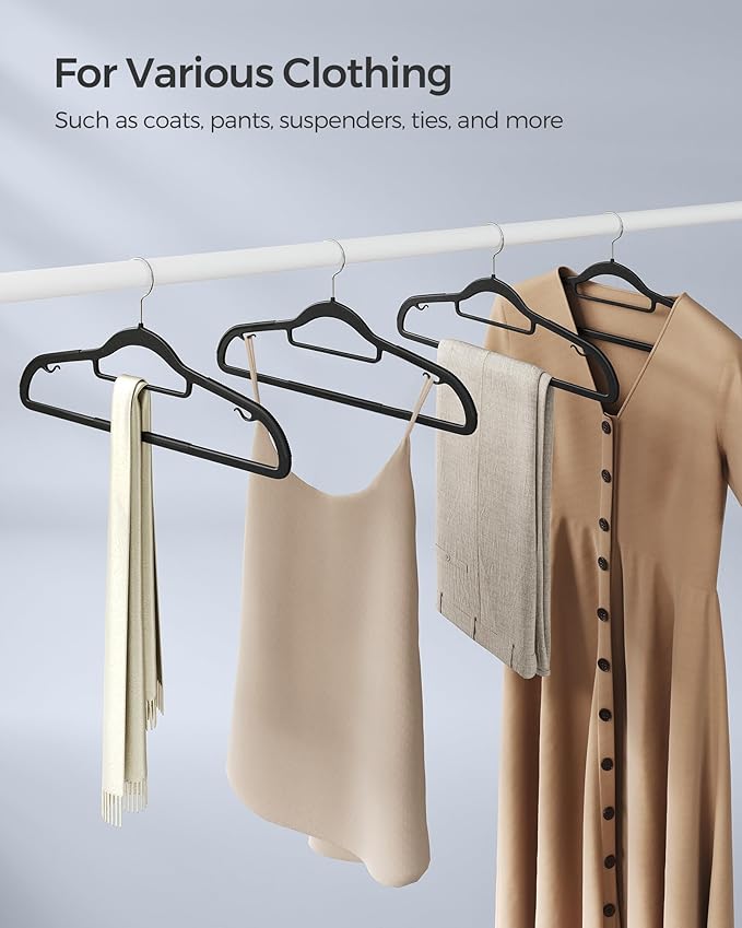 SONGMICS Pack of 30 Coat Hangers, Space-Saving Plastic Clothes Hangers, Non-Slip, 0.2 Inches Slim, 16.5 Inches Wide, 360° Swivel Silver Hook, Black UCRP20BK30
