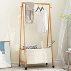Bamboo Clothing Rack with Top Hanging Garment Rod, 2 Side Hooks & Bottom Fabric Storage Basket and 360° Rotating Wheels, Space-Saving Organizer for toys, Hats, Bags & folded clothes