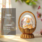 Easter Snow Globe Basket Easter Bunny Eggs Decorations Gifts Auto Snowfall Glitter Music Collection with 6H Timer USB/Battery Powered 6.4 Inch