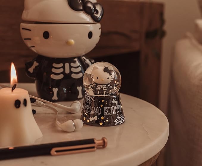 Sanrio Hello Kitty Black Skeleton Mini Light-Up Snow Globe with Swirling Glitter Display | 3 Inches Tall