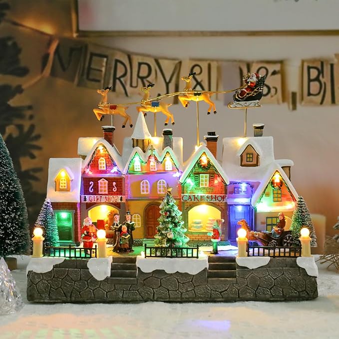 MUMTOP Christmas Village House with Flying Reindeer, Light Up Animated Town Building with Santa Sleigh for Indoor Holiday Xmas Tabletop Decor