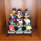 ELEGANTLIFE Acrylic Display Risers Set of 4, 4-Level Tiered Display Stands for Cupcakes, Small Figures & Jewelry, Compact Countertop Display Shelf, Multiple Colors Available (Black)