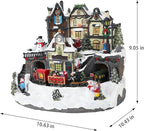 MUMTOP Christmas Village House Decoration, Colourful LED Lights Light Up Bell Tower and Buildings, Rotating Christmas Trees with Music for Indoor Holiday Xmas Tabletop Decor