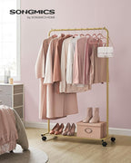 SONGMICS Clothes Rack with Wheels, Clothing Rack for Hanging Clothes, 25.4 mm Metal Garment Rack with Dense Mesh Storage Shelf, 110 lb Load Capacity, 2 Brakes, Gold UHSR025A01