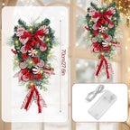 Yunlly 28" Pre Lit Christmas Teardrop Swag Battery Operated Christmas Swag with Lights, Red and White Bowknot, Swirl Candy Cane Ball, Xmas Wreath Ornament for Indoor Outdoor Front Door Decoration