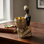 Lescafita Handmade African Tribal Woman Sculpture - Gold Adorned Seated Figure with Basket, Vintage Resin Statue for Home Decor, Unique Housewarming Gift for Shelf/Table (9.65" H)