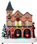 MOMENTS IN TIME Lighted Fire Station Christmas Village 12” Animated Building with LED Lights, 8 Classic Songs & Moving Fire Trucks Power Adapter Included Gift Ready Décor Holiday Display Piece
